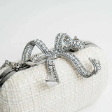 Boucle Cream Bow Clutch Bag